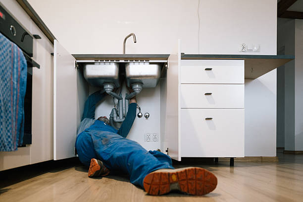 Professional Drain Cleaning technician working in Monroe, IN